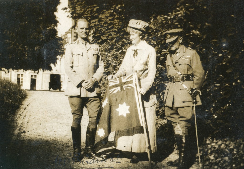 The Baroness with the Australian flag and the generals Birdwood ( left) and Cox (right)
